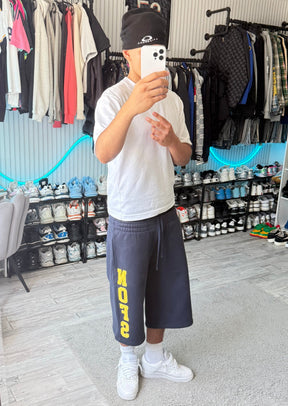 SHORT 3/4 BLEU MARINE/JAUNE
